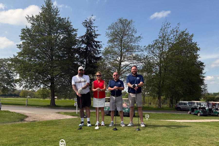 Four golfers standing with their drivers, from left to right Tigers Team Captain Jon Paul Bond, Lady Captain Suzannah Wilby, Club Captain Dave Narey and Scratch Team Captain Chris Sugden.
