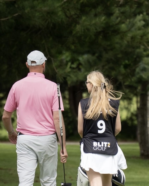 PGA Professional Mark McGeehan with his daughter Evie as his caddy.