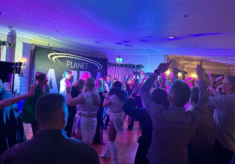 A full dancefloor at The Manor Leeds while Planet ABBA perform.