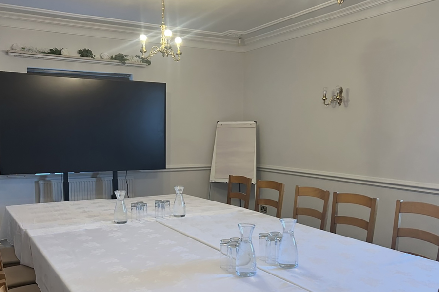 Sunset Drive at The Manor Leeds set-up for a conference with the 84" digital display.